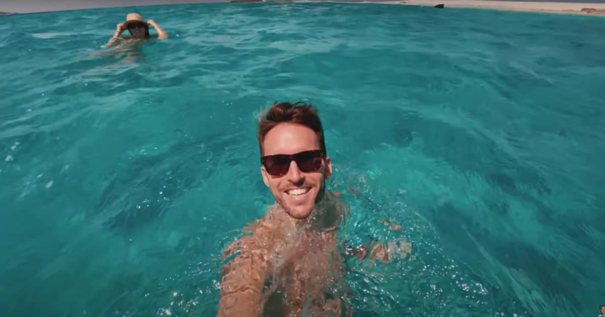 YouTuber Benjamin Ortega films while swimming using a GoPro action camera.
