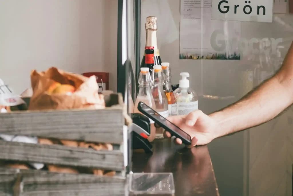 coffee shop POS paying at the register