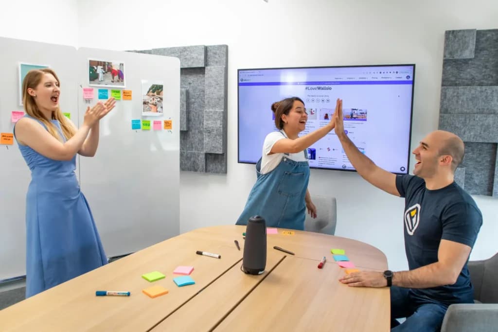 high fives in the office